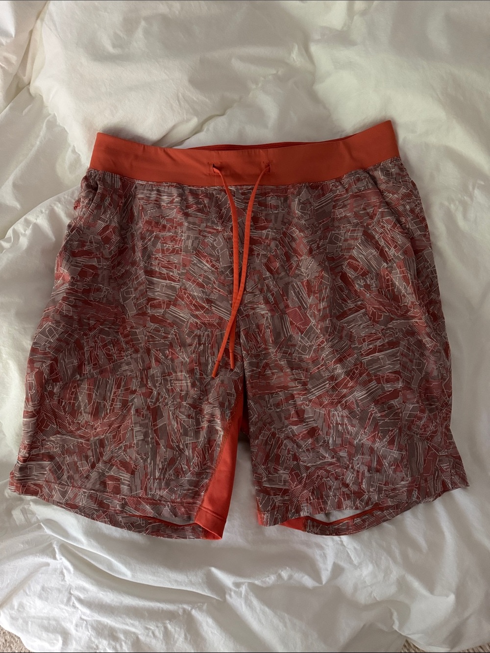 Lululemon like new!  Men's orange Patterned Athletic Shorts
